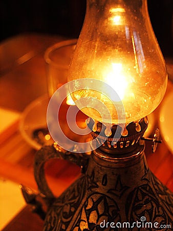 Burning oil lamp