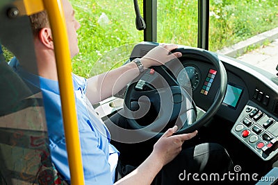 Bus driver sitting in his bus