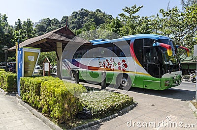 Bus took tourists in Thailand at a stop