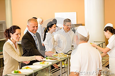 Business colleagues cook serve lunch canteen food