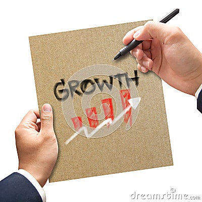 Business hand with pen writing growth on paper concept