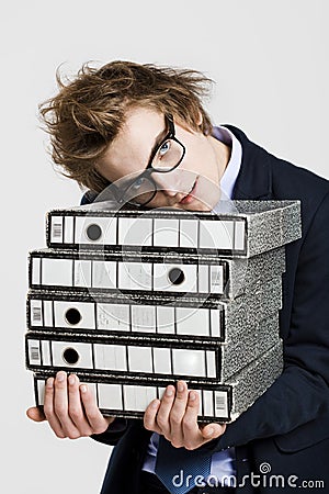 Business man carrying folders