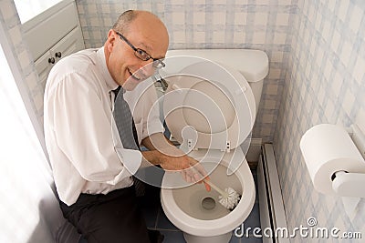 Business Man cleaning toilet