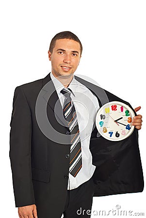 Business man with clock in interior of jacket