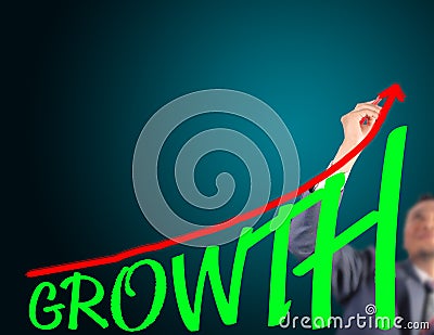 Business man drawing curve of growth