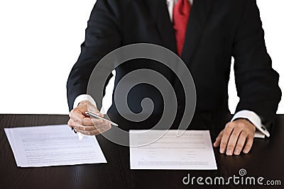 Business man lending a pen to sign a contract