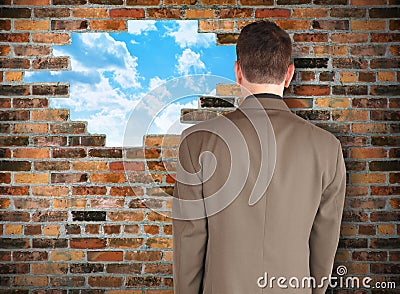 Business Man Looking at Hope Wall