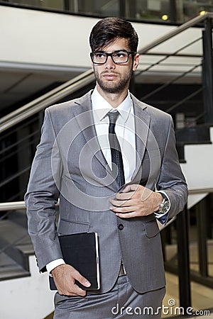 Business man portrait in an office environment