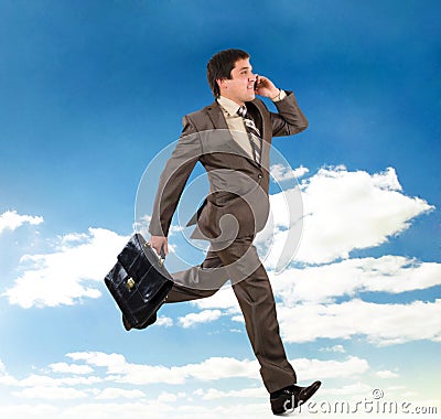 Business man running with a briefcase