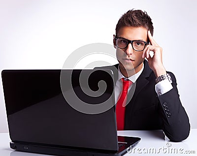 Business man thinking at desk