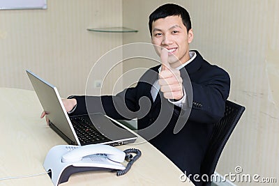 Business man thumbs up