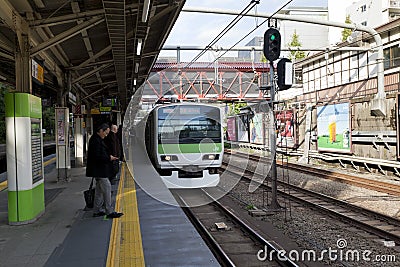 Business man waiting for train