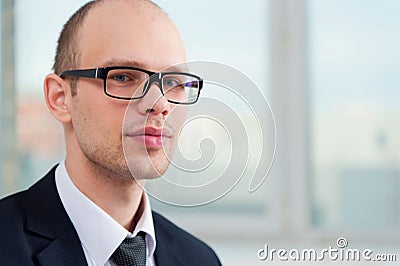 Business man wearing glasses in suit