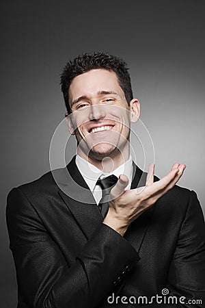 Business man in white shirt and black suit.