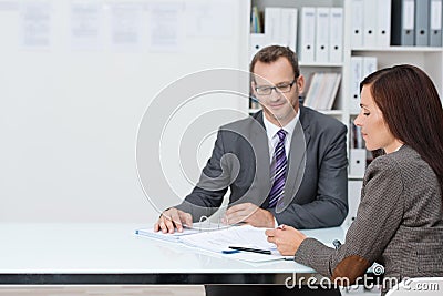 Business man and woman in a meeting