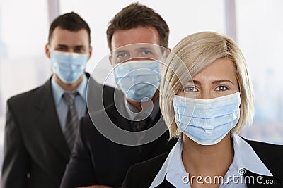Business people fearing h1n1 virus
