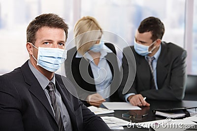 Business people fearing h1n1 virus