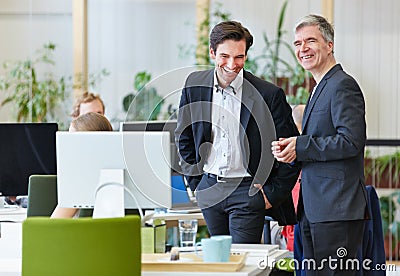 Business people laughing during