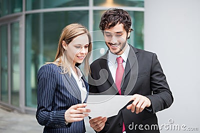 Business people reading a document