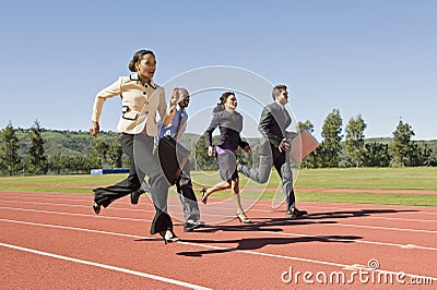 Business People Running On Racing Track