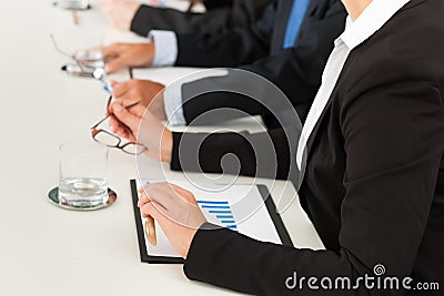 Business - people sitting in a meeting