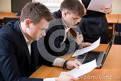 Business people study the project