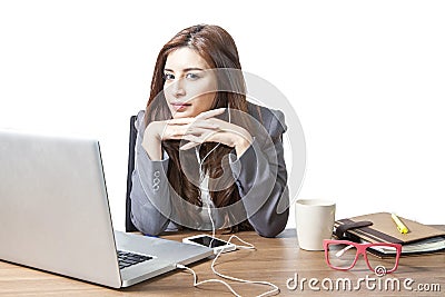 Business woman attractive enjoy with listening music on the desk