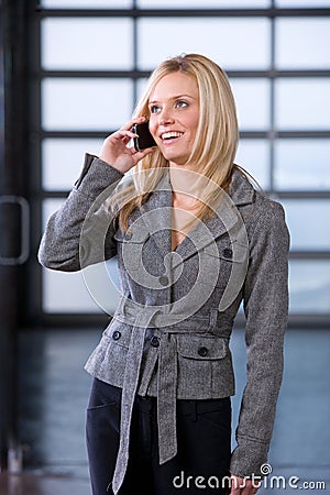 Business woman on a cell phone i