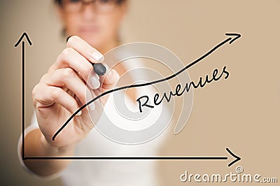 Business woman drawing a revenue graph