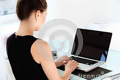 Business Woman with a laptop at the оffice