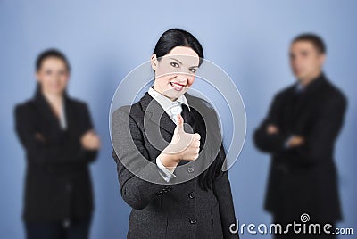 Business woman leader giving thumbs up