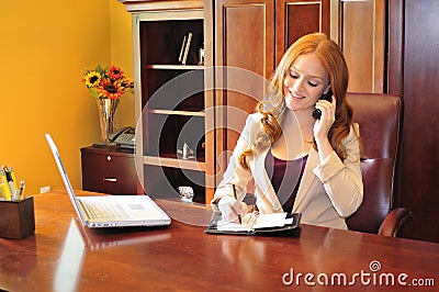 Business woman making a phone call