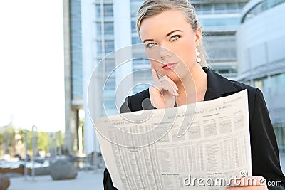 Business Woman Reading Newspaper