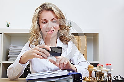 Business woman with smartphone