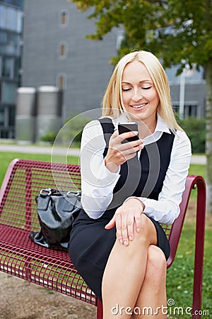 Business woman with smartphone