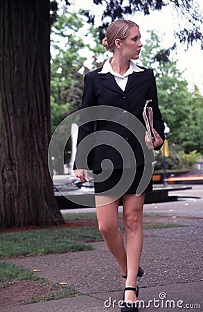 Business woman walking.