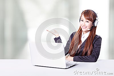 Business woman wearing headset with smile