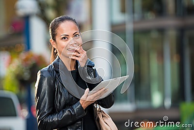 Business woman working on tablet pc