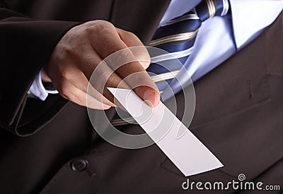 Businessman with a blank business card