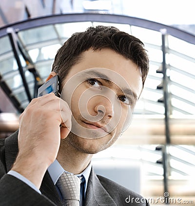 Businessman calling on phone