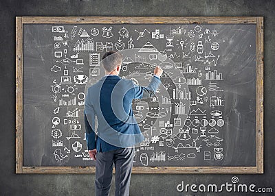 Businessman drawing business plan, graph, chart