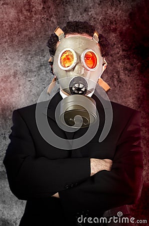 Businessman with gas mask, risk concept