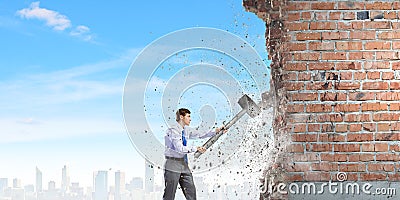 Businessman with hammer