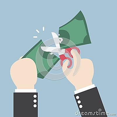 Businessman Hands holding scissors and cutting dollar