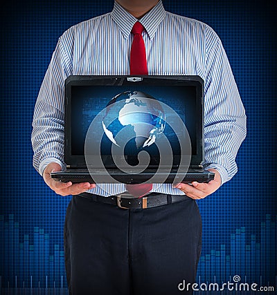 Businessman holding a laptop showing business graph