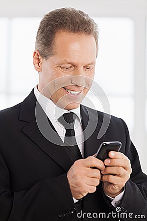 Businessman with mobile phone.