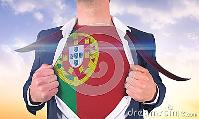 Businessman opening shirt to reveal portugal flag