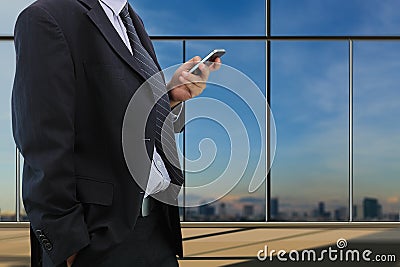 Businessman play smart phone