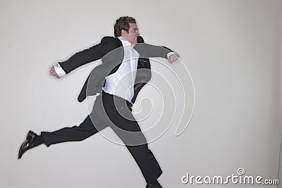 Businessman running