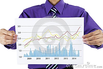 A businessman showing business statistics
